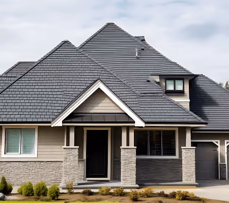 Modern single-story house with dark gray metal roof