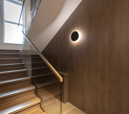 A minimalist stairs with glass railing