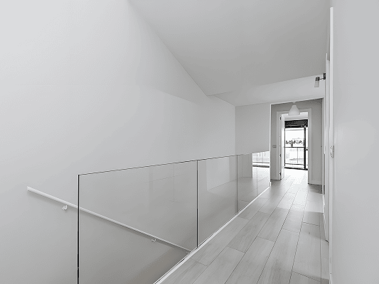 luxury balcony featuring modern glass railings