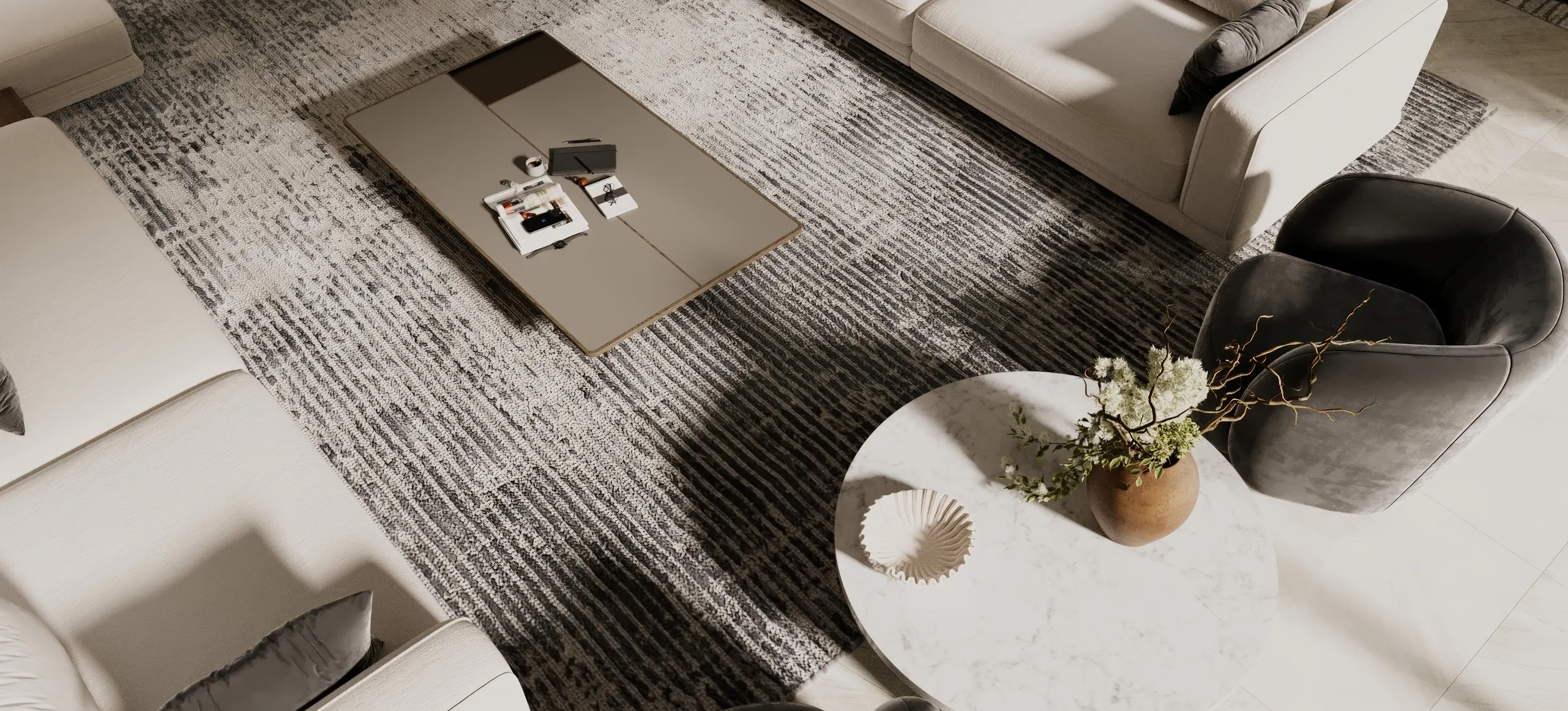 Minimal living area with textured rug, coffee table, and accent chair