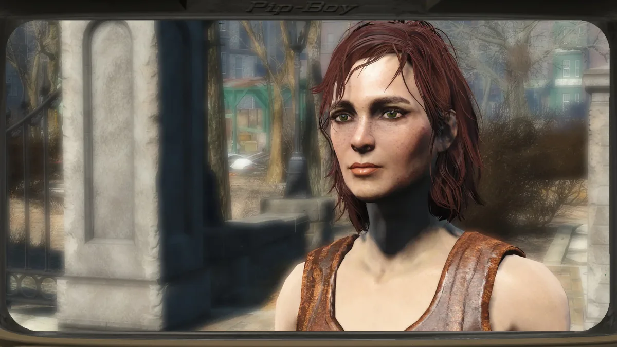 Primer plano de Cait, la luchadora pelirroja de Fallout 4