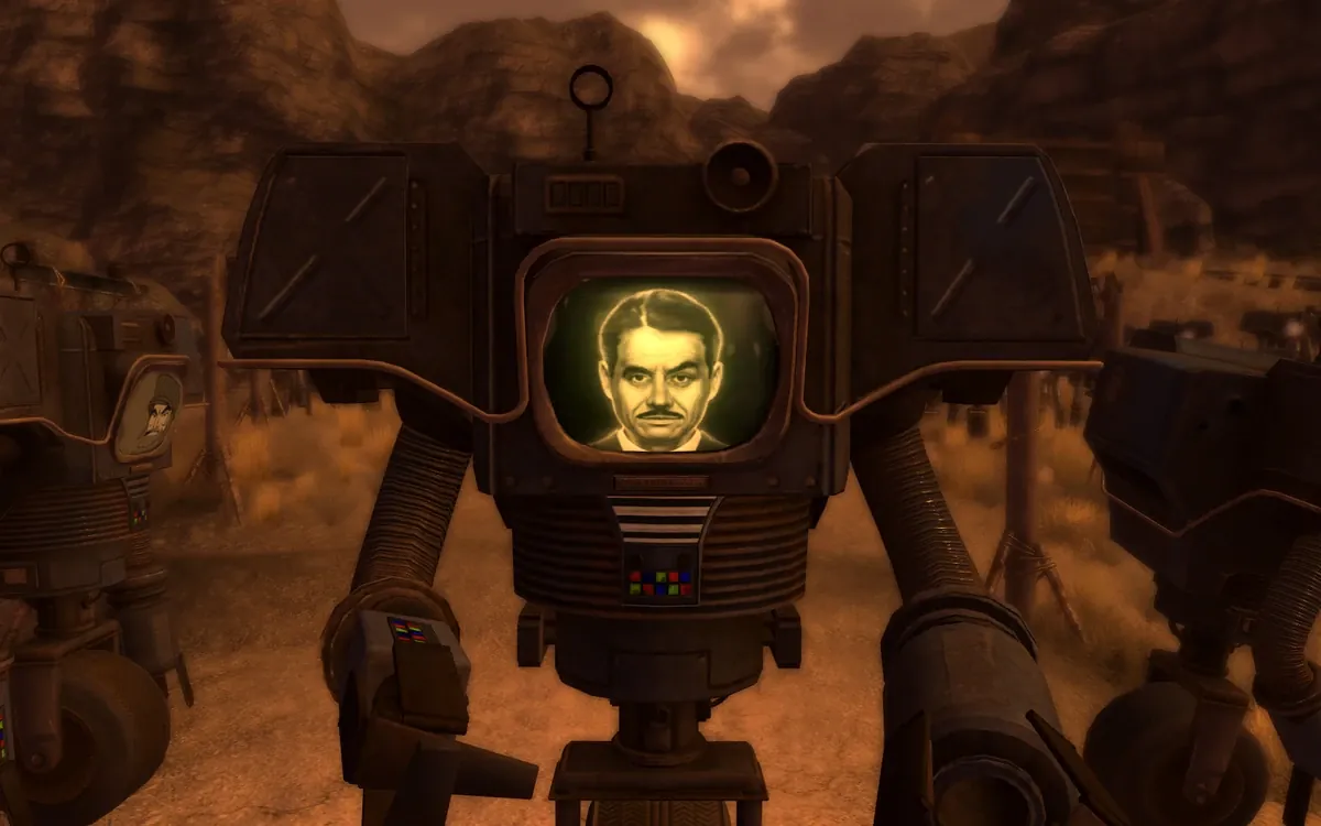 Un securitron con el rostro digital del señor House en su pantalla patrulla el desierto de Mojave