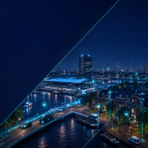 Amsterdam waterfront at night with smart city connectivity overlays on tram and transit infrastructure