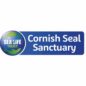 Sea Life Trust logo next to text reading Cornish Seal Sanctuary in white on a blue background.