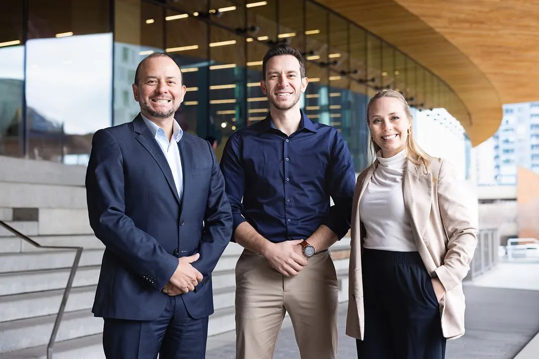 Two men and a woman power pose. Potential Engineering co-founders
