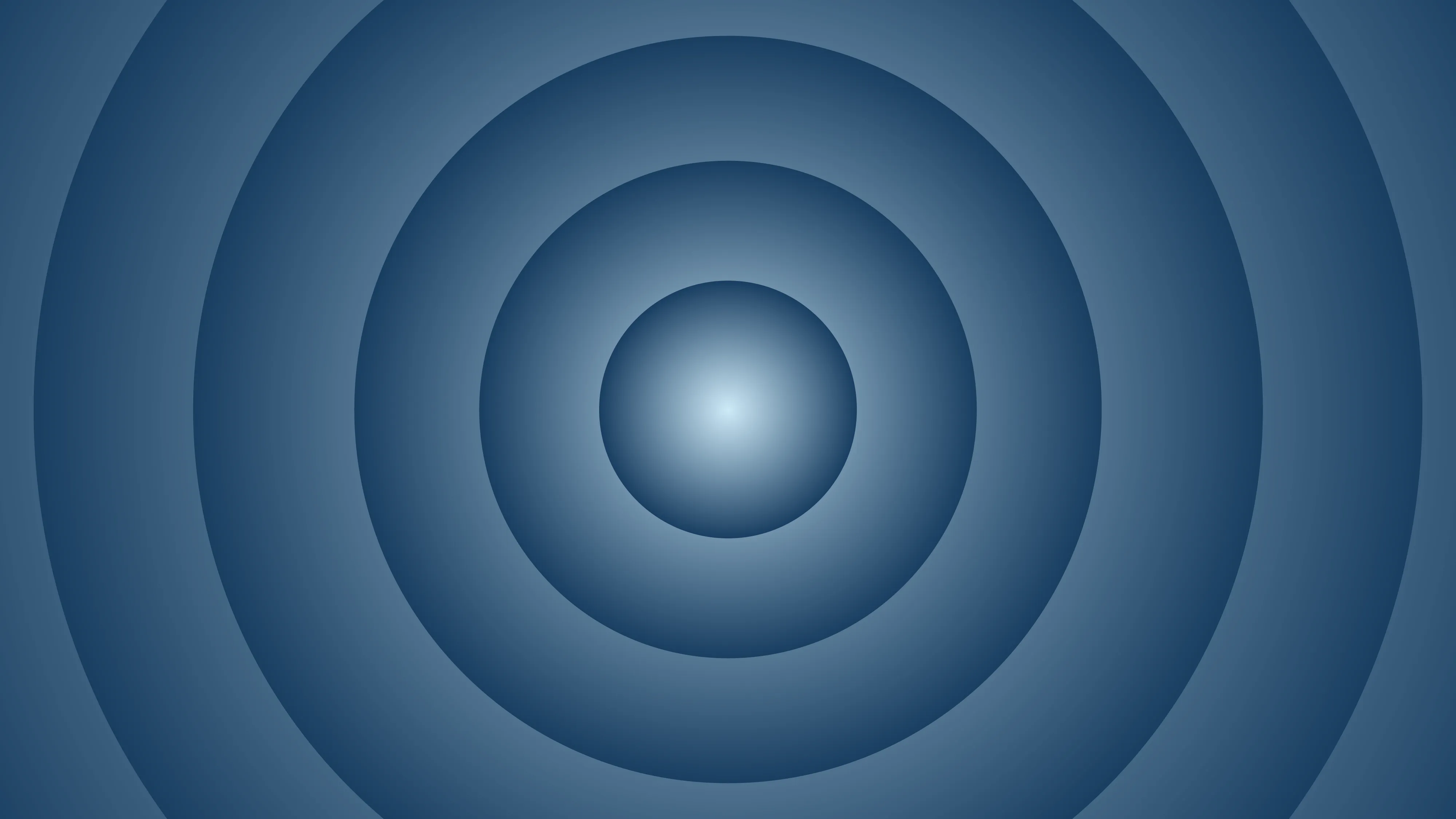 Discos concéntricos en tonos de azul con un degradado que va del centro claro al exterior más oscuro.