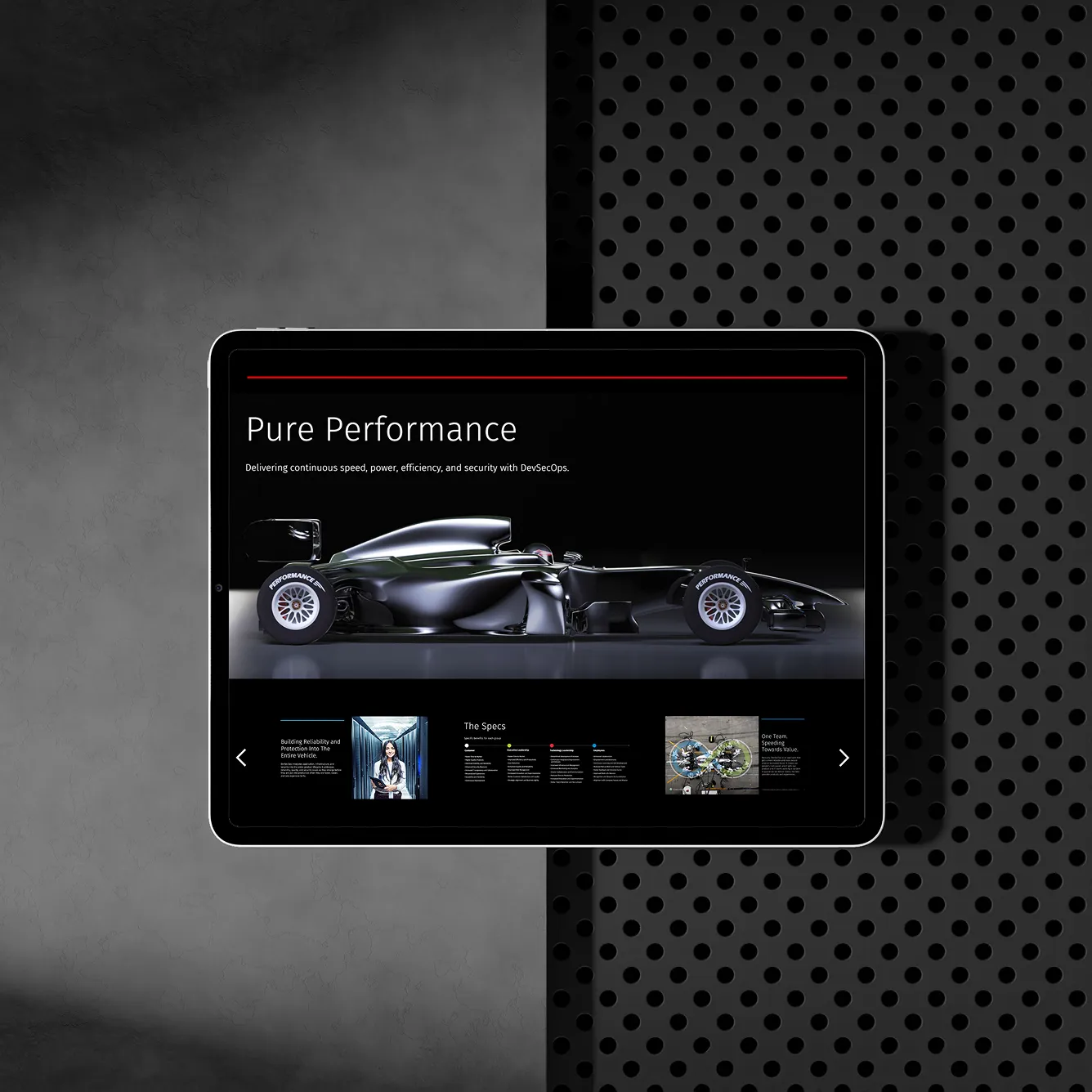 Tablet displaying a webpage with a side view of a sleek black race car and the headline 'Pure Performance'.