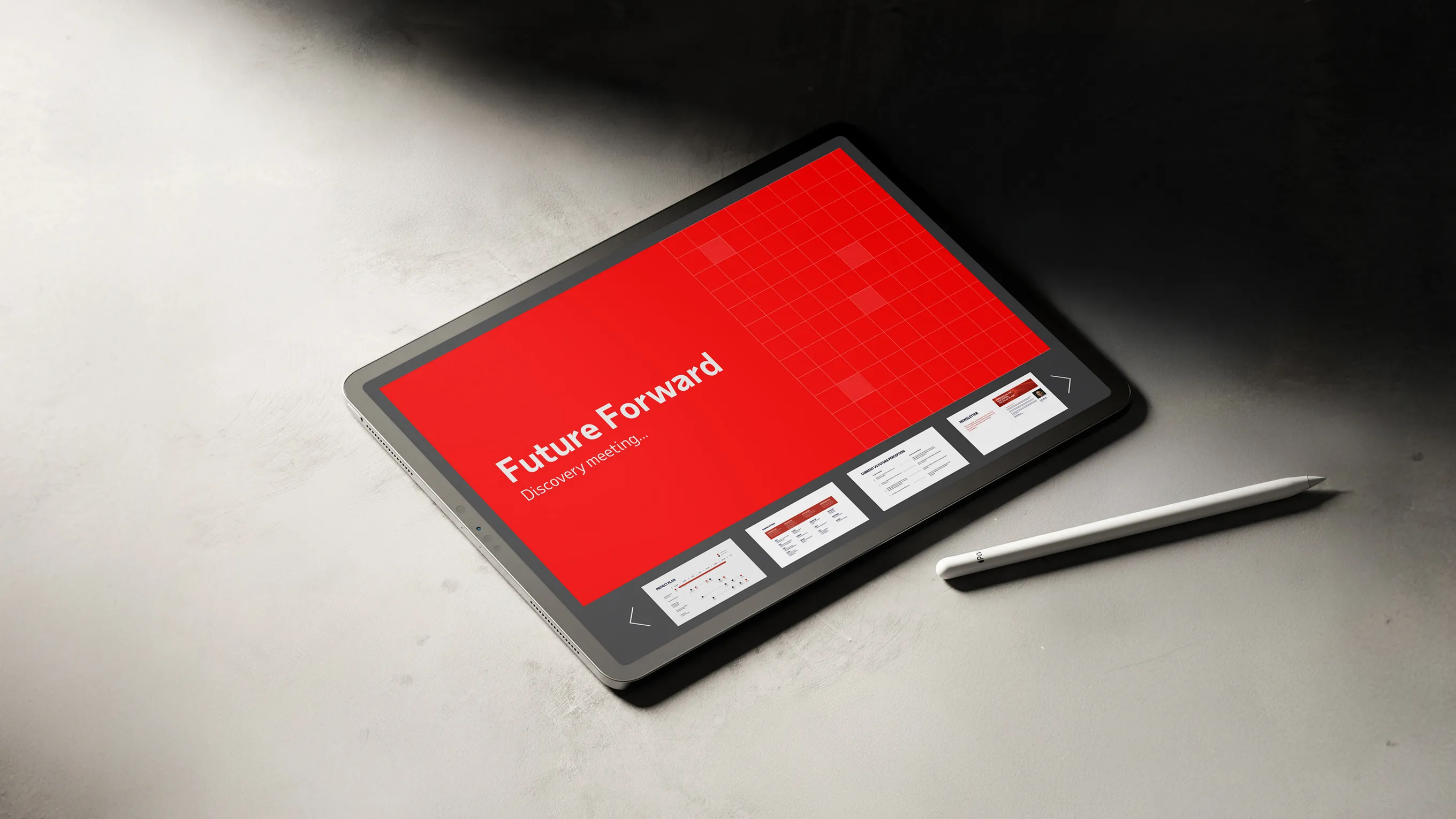 Tablet displaying a presentation slide titled 'Future Forward Discovery meeting...' with a white stylus placed beside it on a grey surface.