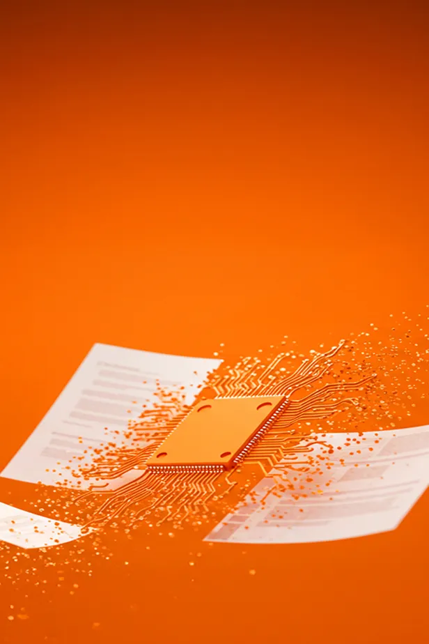 Orange computer chip with circuits extending outward, blending into scattered digital particles over a bright orange background.