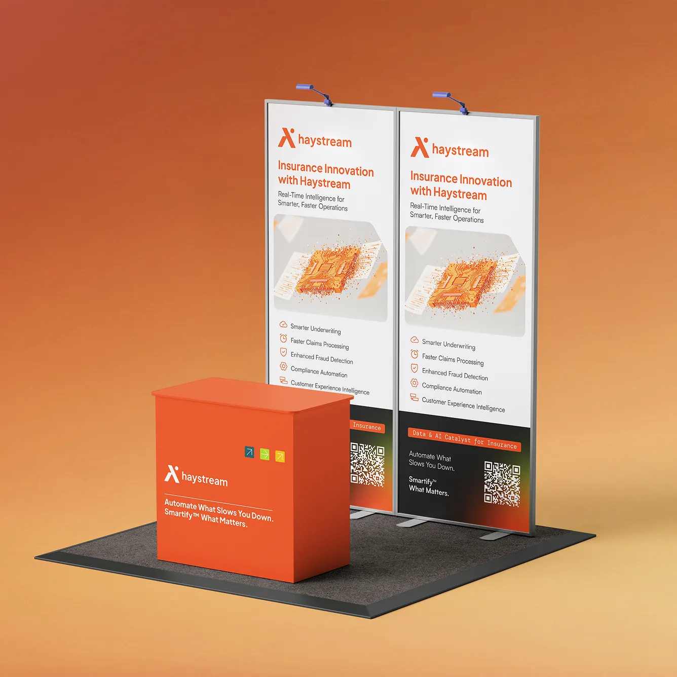 Haystream branded exhibition booth with an orange counter displaying the tagline 'Automate What Slows You Down. Smartify™ What Matters' and two vertical banners promoting insurance innovation and real-time intelligence.