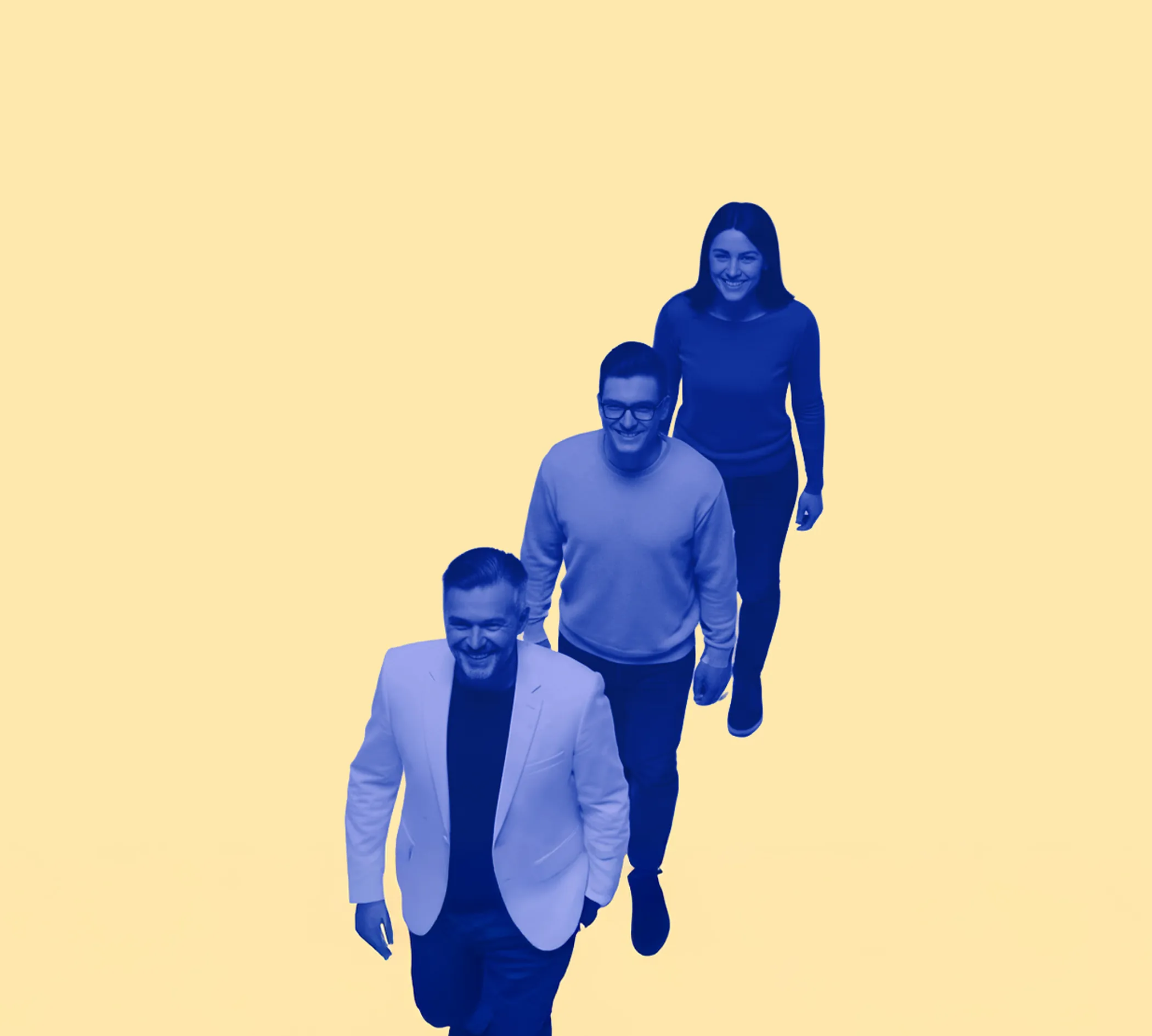 Three smiling people walking in a line against a solid pale yellow background.