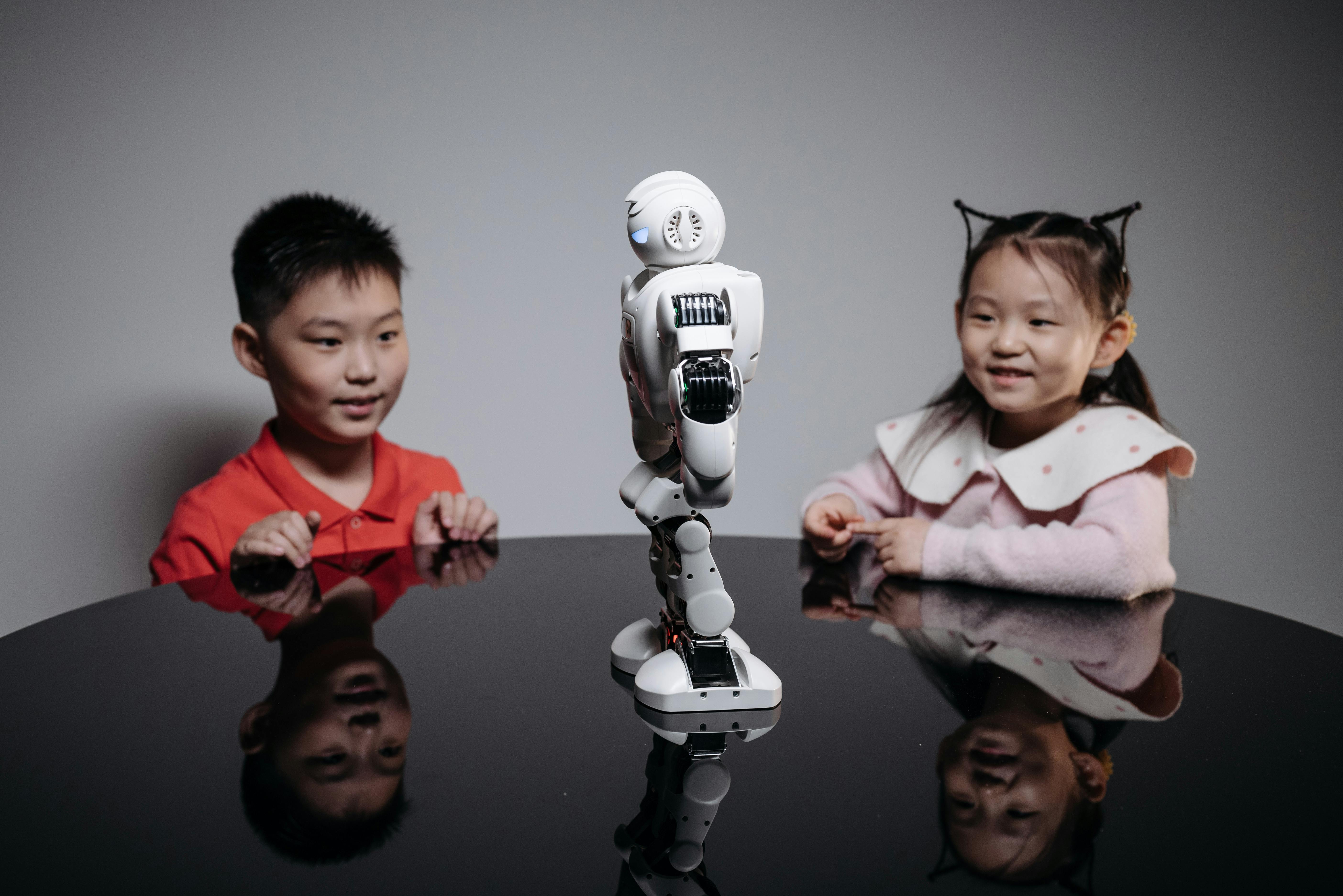 Children playing with robot