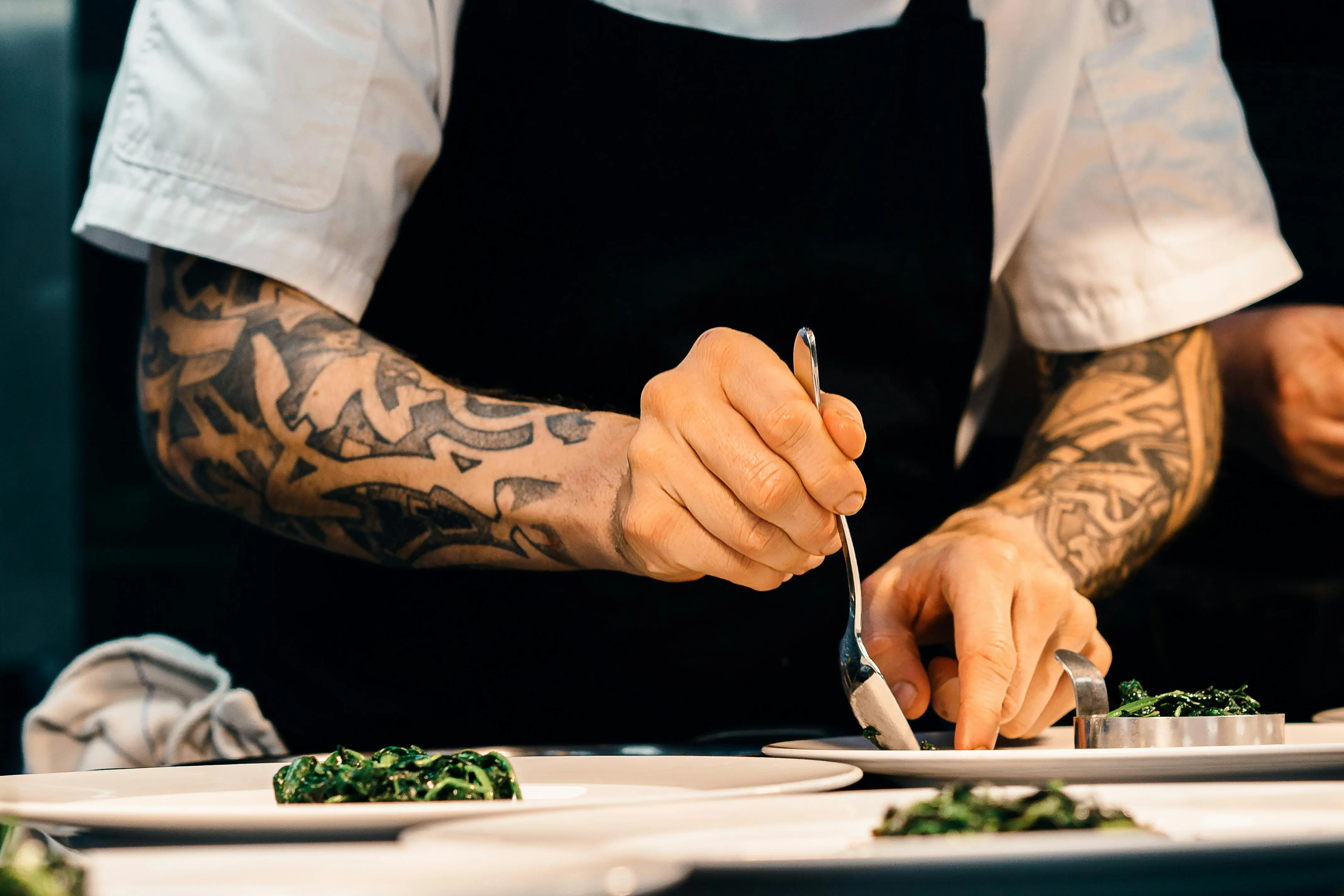 image of chef preparing dishes (for a chinese restaurant)