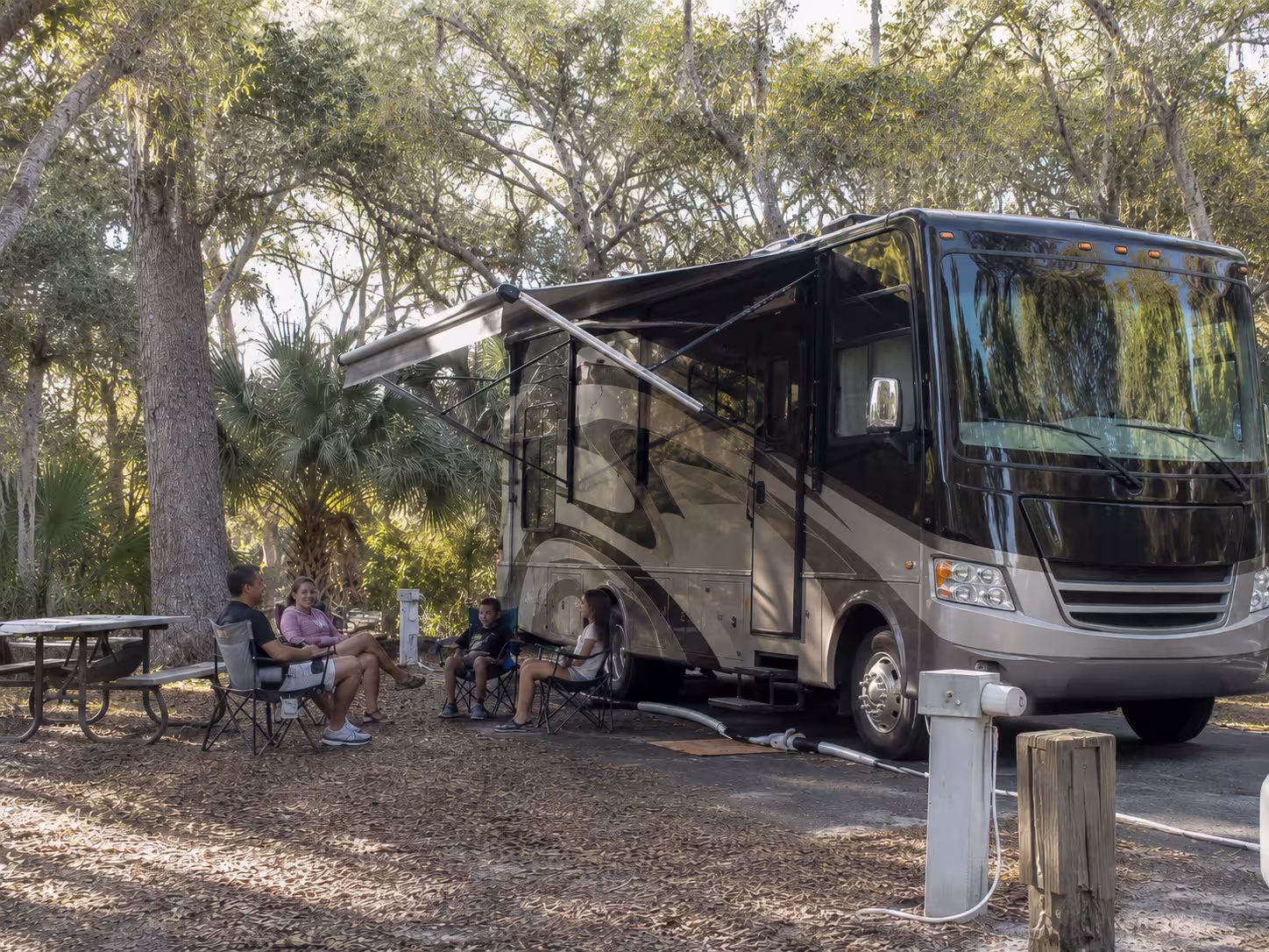 Class A motorhome set up at Fort Clinch State Park
