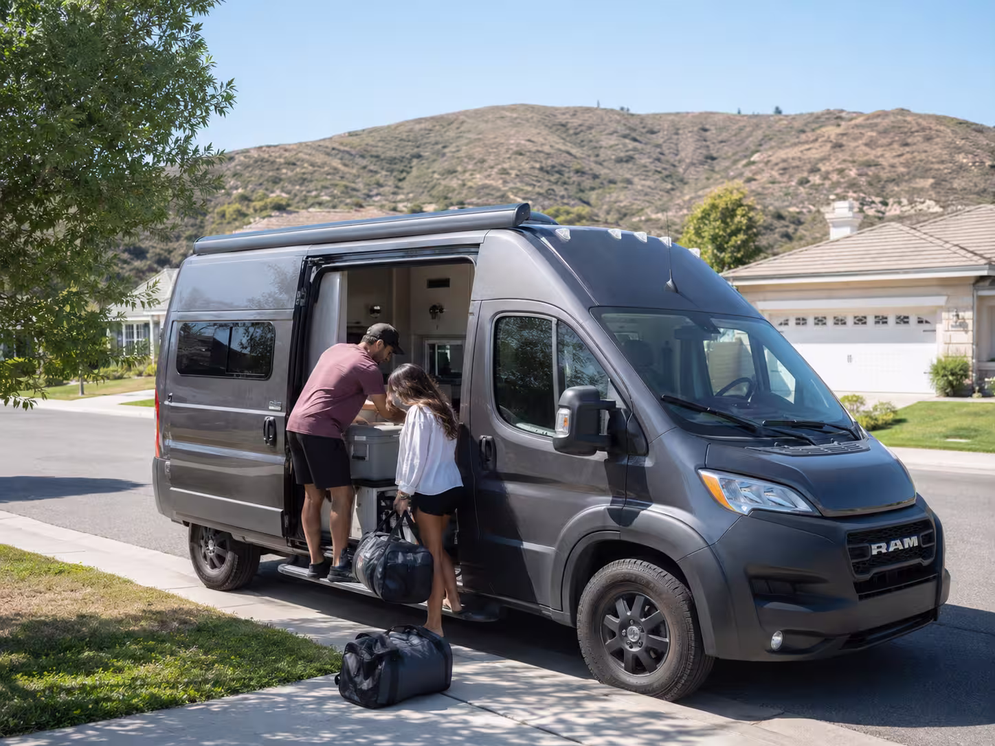 Small RV campervan parked in a Murrieta neighborhood