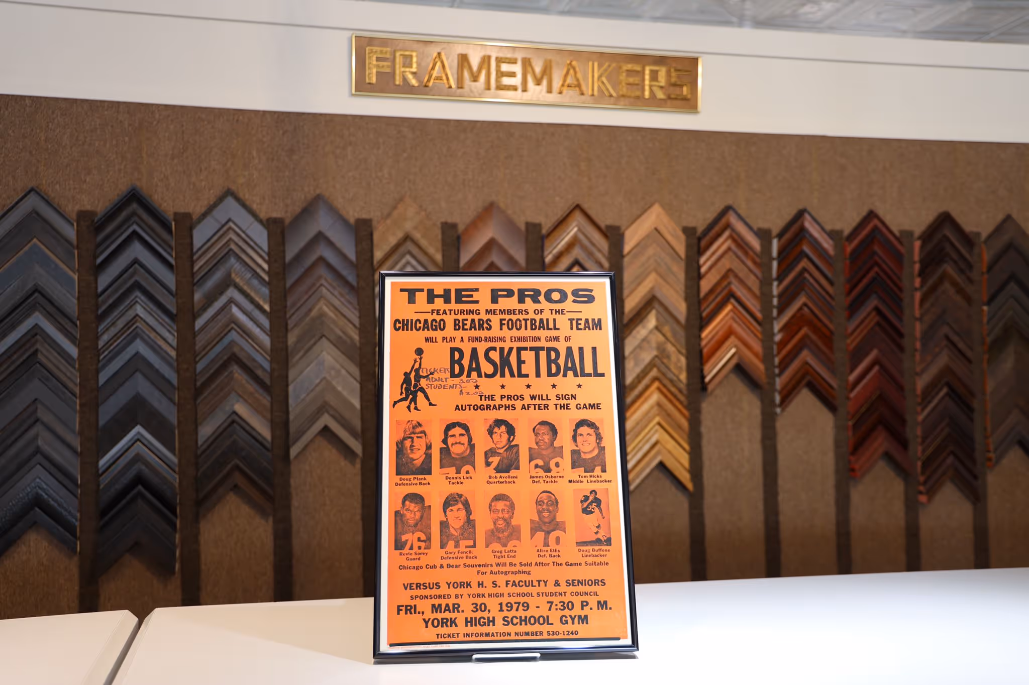 Framed vintage poster advertising a charity basketball game featuring Chicago Bears football team members against York High School faculty and seniors, dated March 30, 1979.