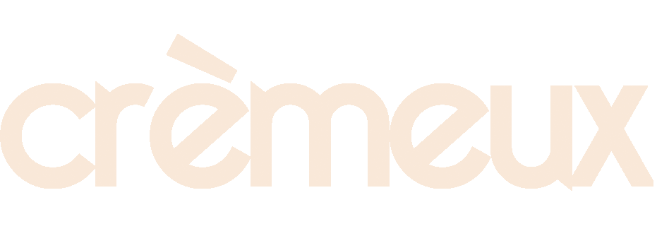 The word 'crèmeux' written in light beige lowercase letters with a diacritical accent over the first 'e'.