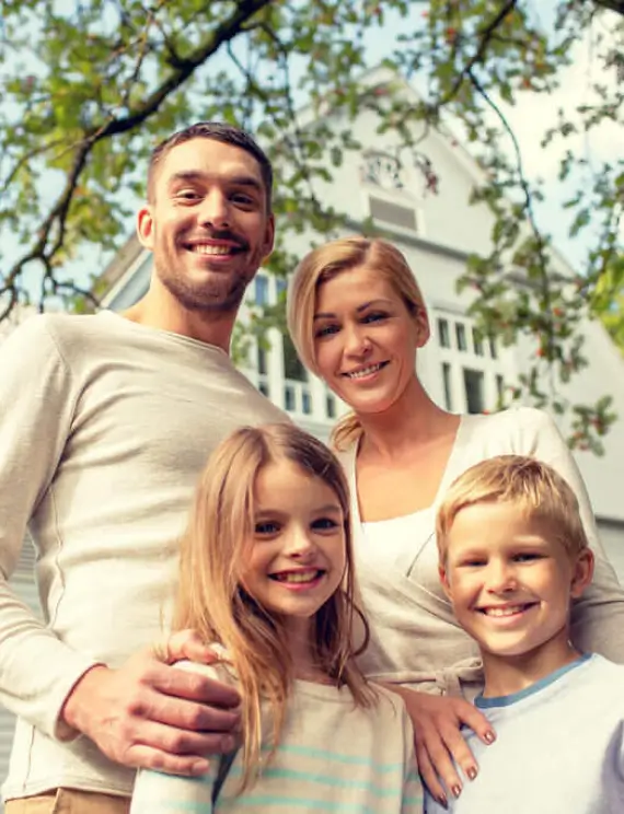 Photo of a happy family enjoying their new house
