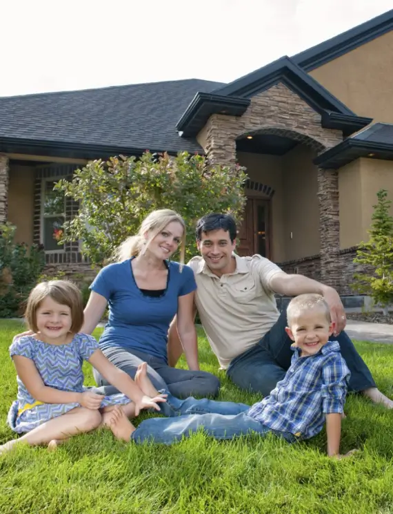 Photo of a happy family enjoying their new house