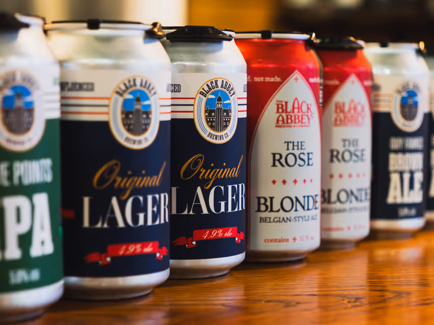 Image of a line up of canned beer. Left to right: Five Points IPA, Original Lager, Rose Blonde Ale and Guy Fawkes Brown Ale. 