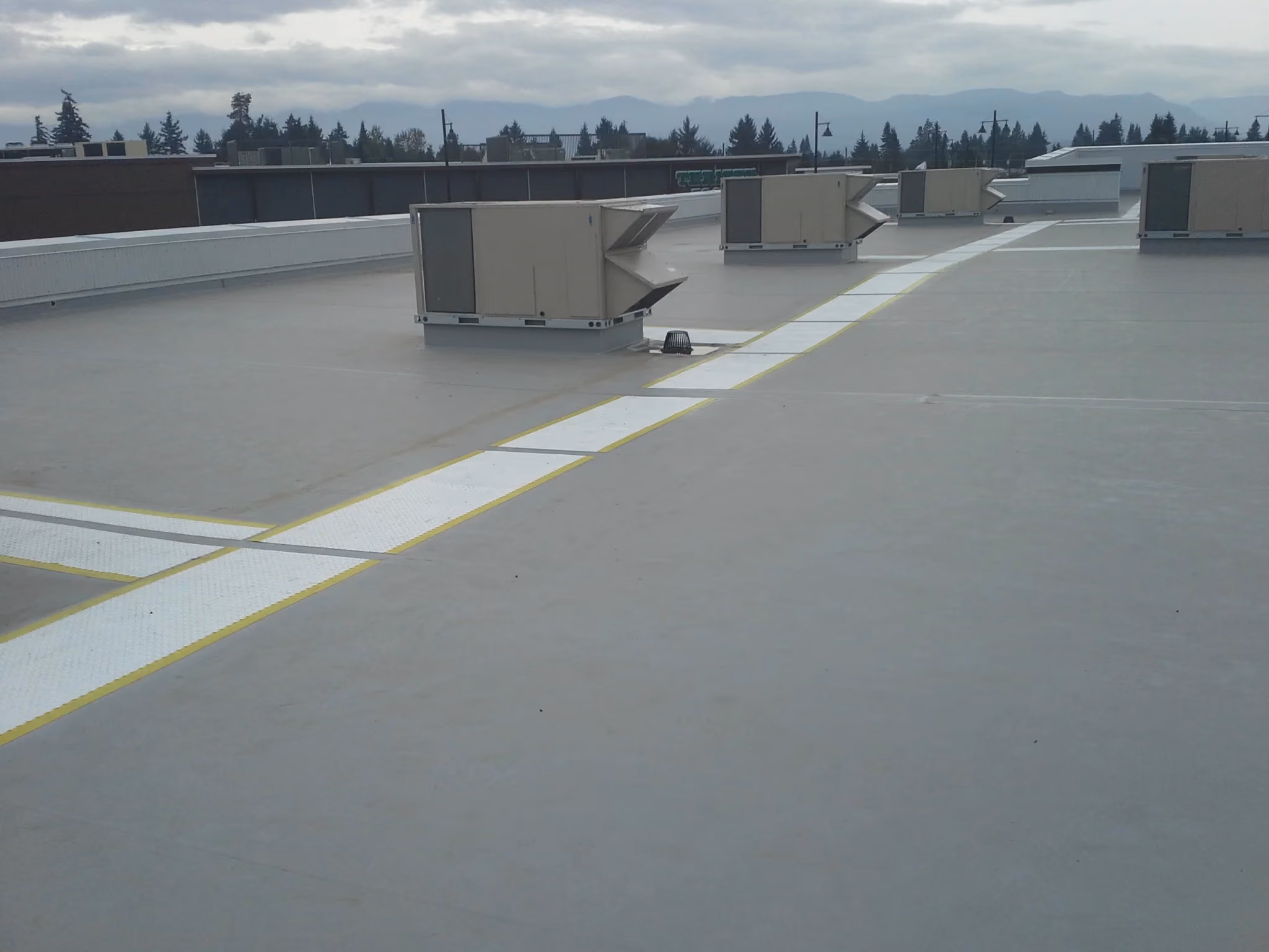 Roof and wall systems for Building H at Crown Isle Resort in Comox.