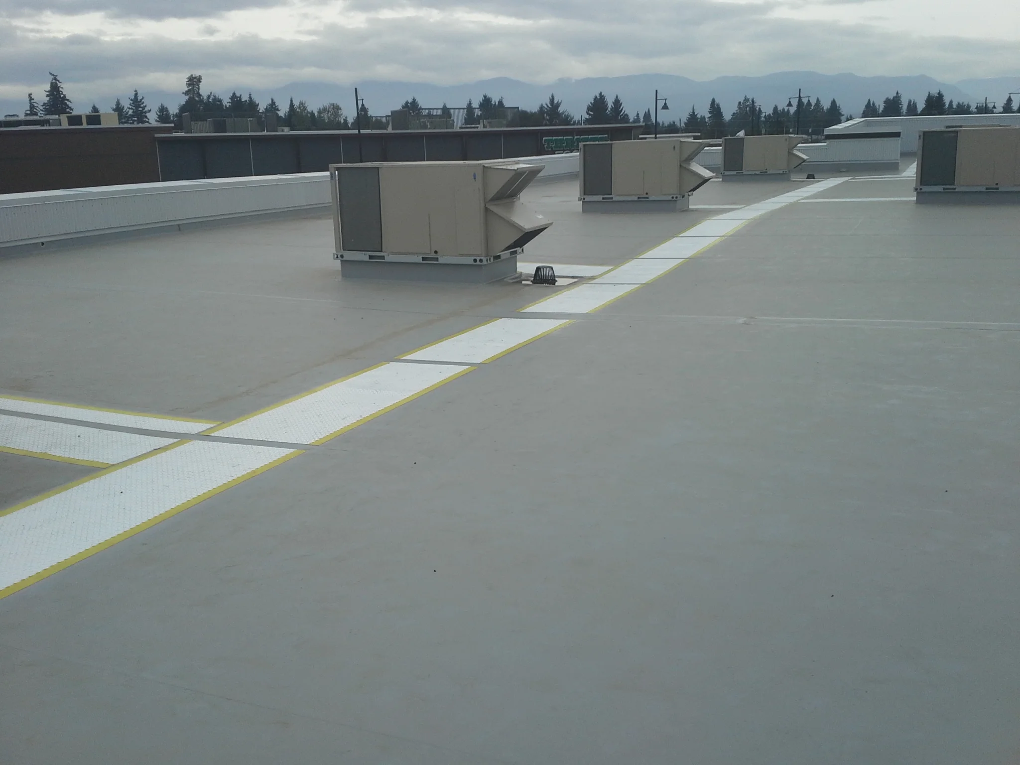 Roof and wall systems for Building H at Crown Isle Resort in Comox.
