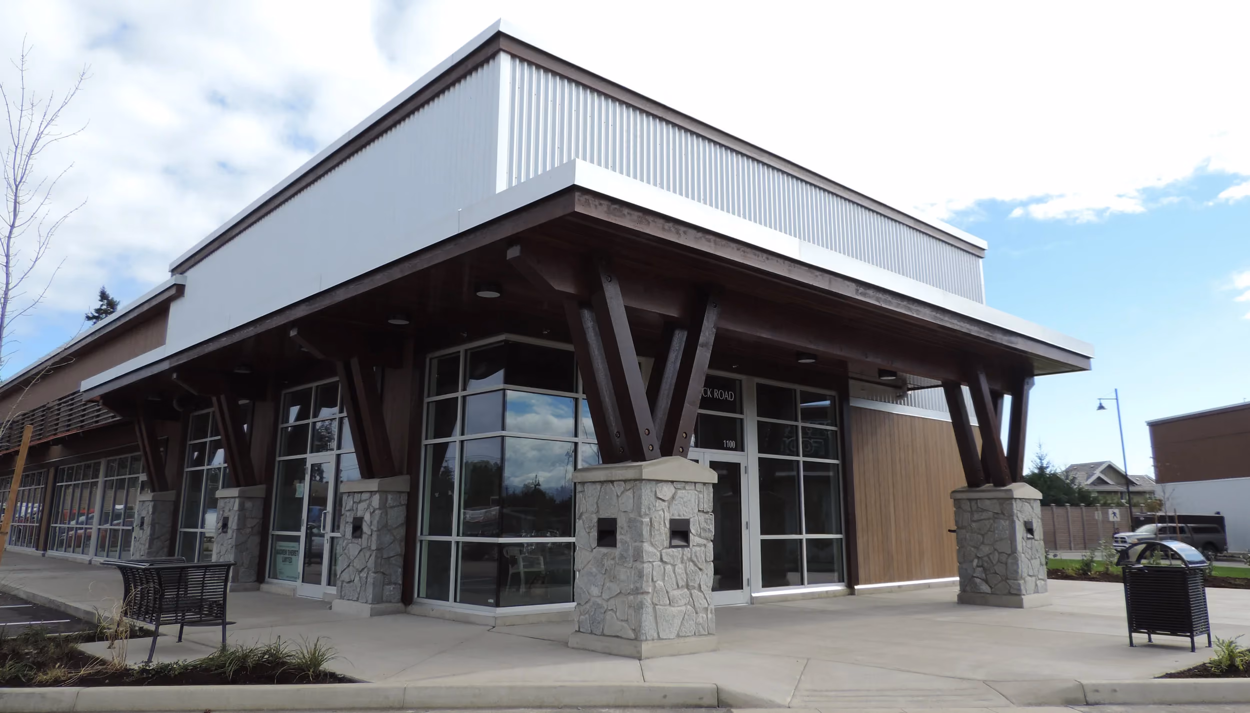 Crown Isle Building H — roofing and sheet metal by Nelson Roofing & Sheet Metal Ltd.
