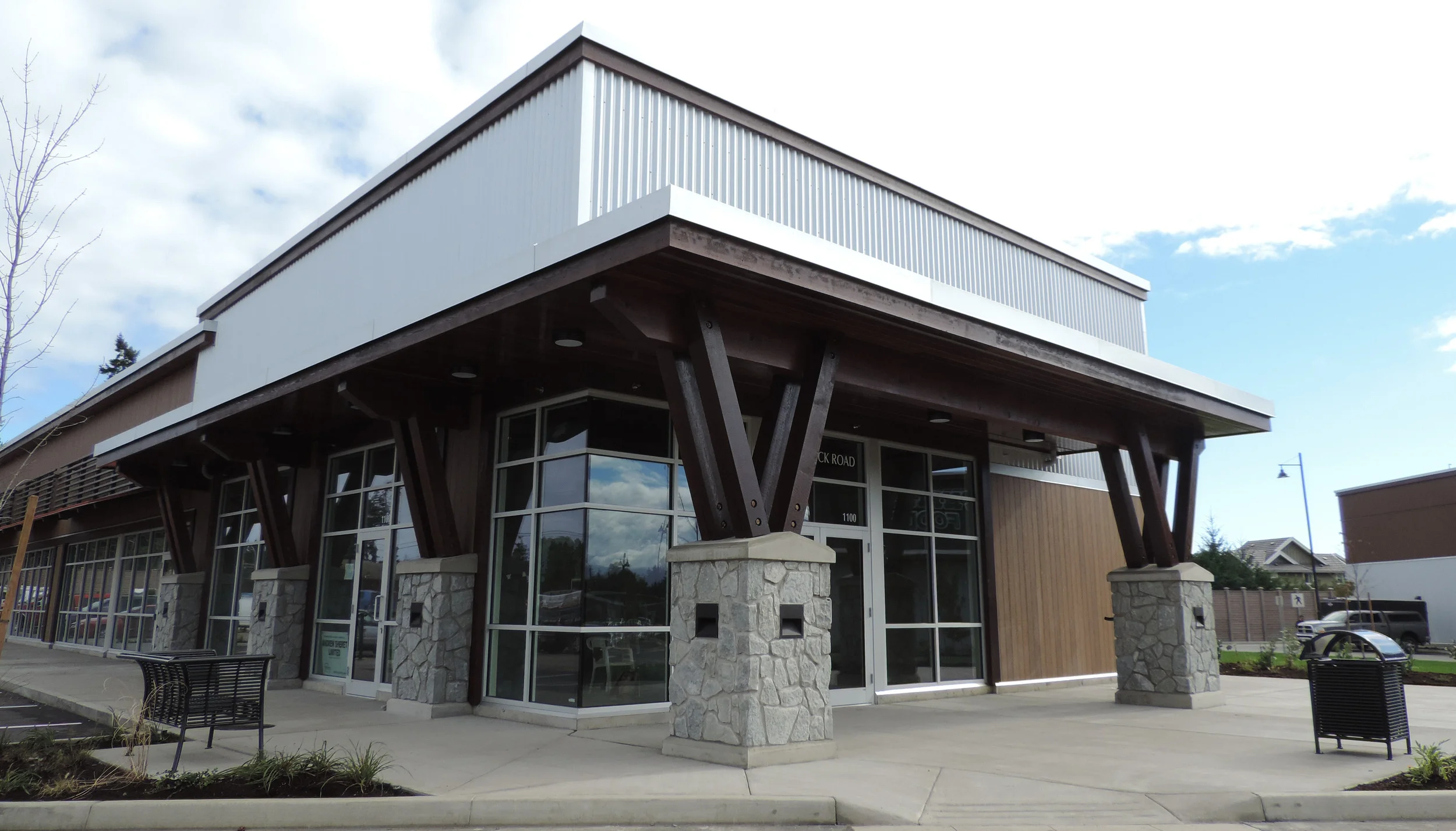 Crown Isle Building H — roofing and sheet metal by Nelson Roofing & Sheet Metal Ltd.