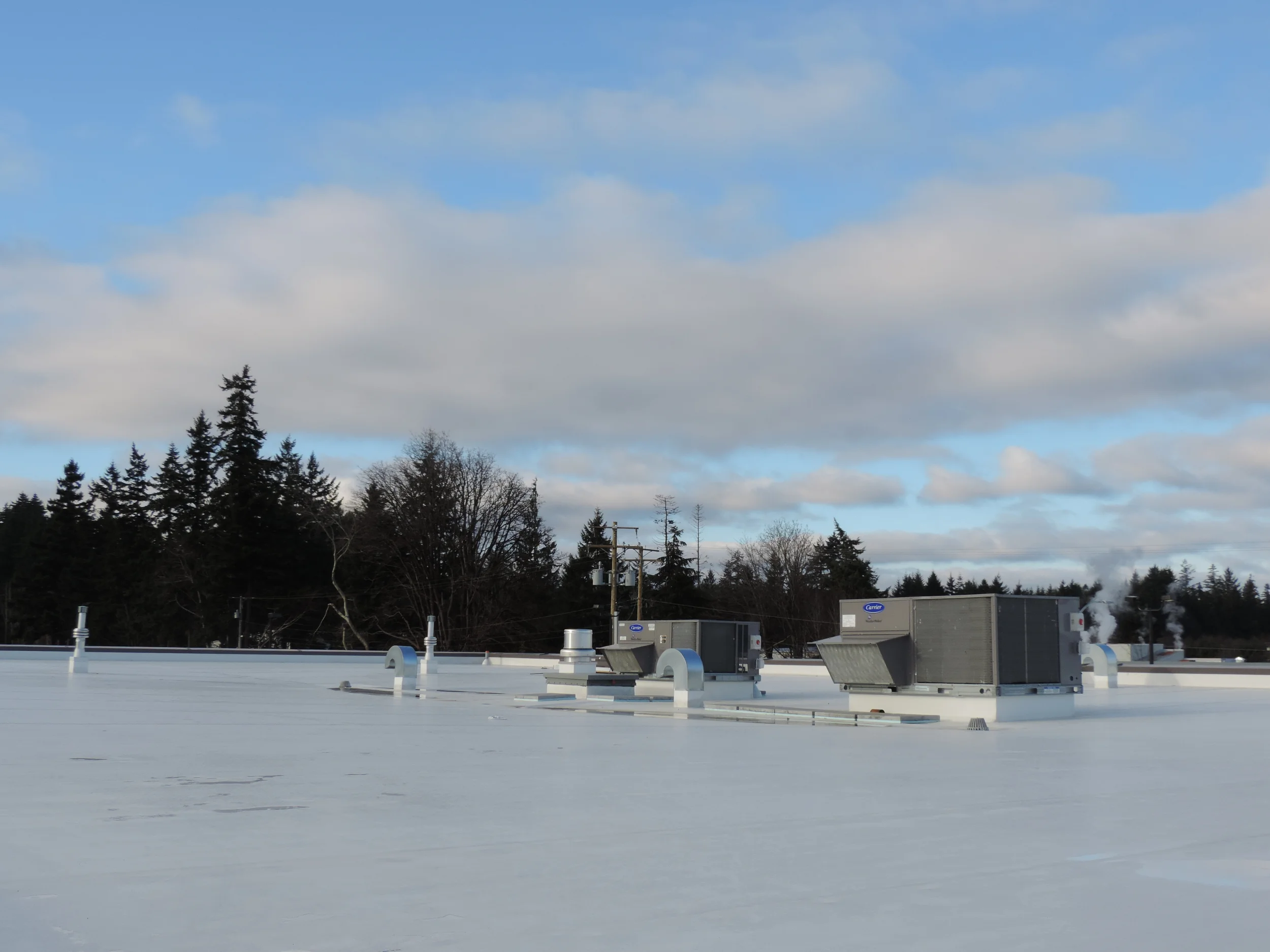 Campbell River Hospital Roof Replacement — roof installation in progress by Nelson Roofing (photo 2)