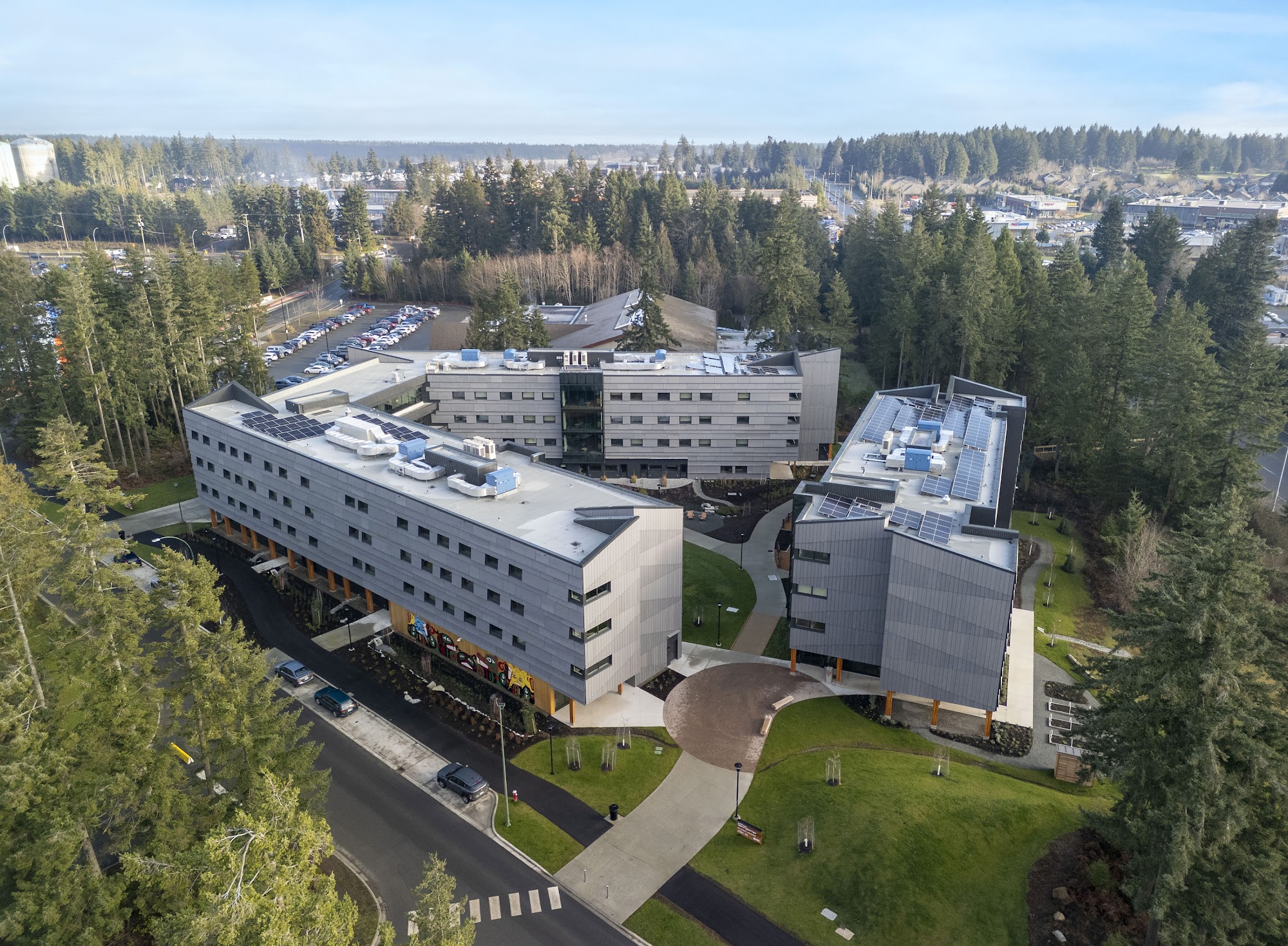 Sheet-metal cladding by Nelson Roofing on NIC Student Housing’s two mass-timber buildings in Courtenay.