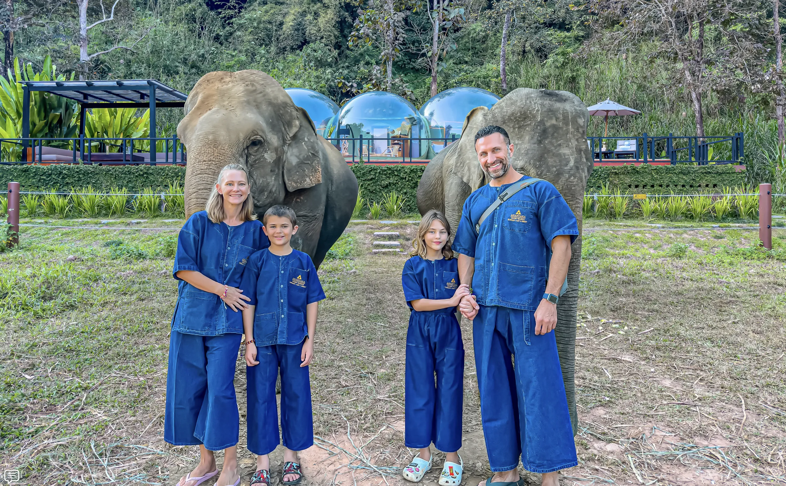 The Lockwood family stands with rescue elephants