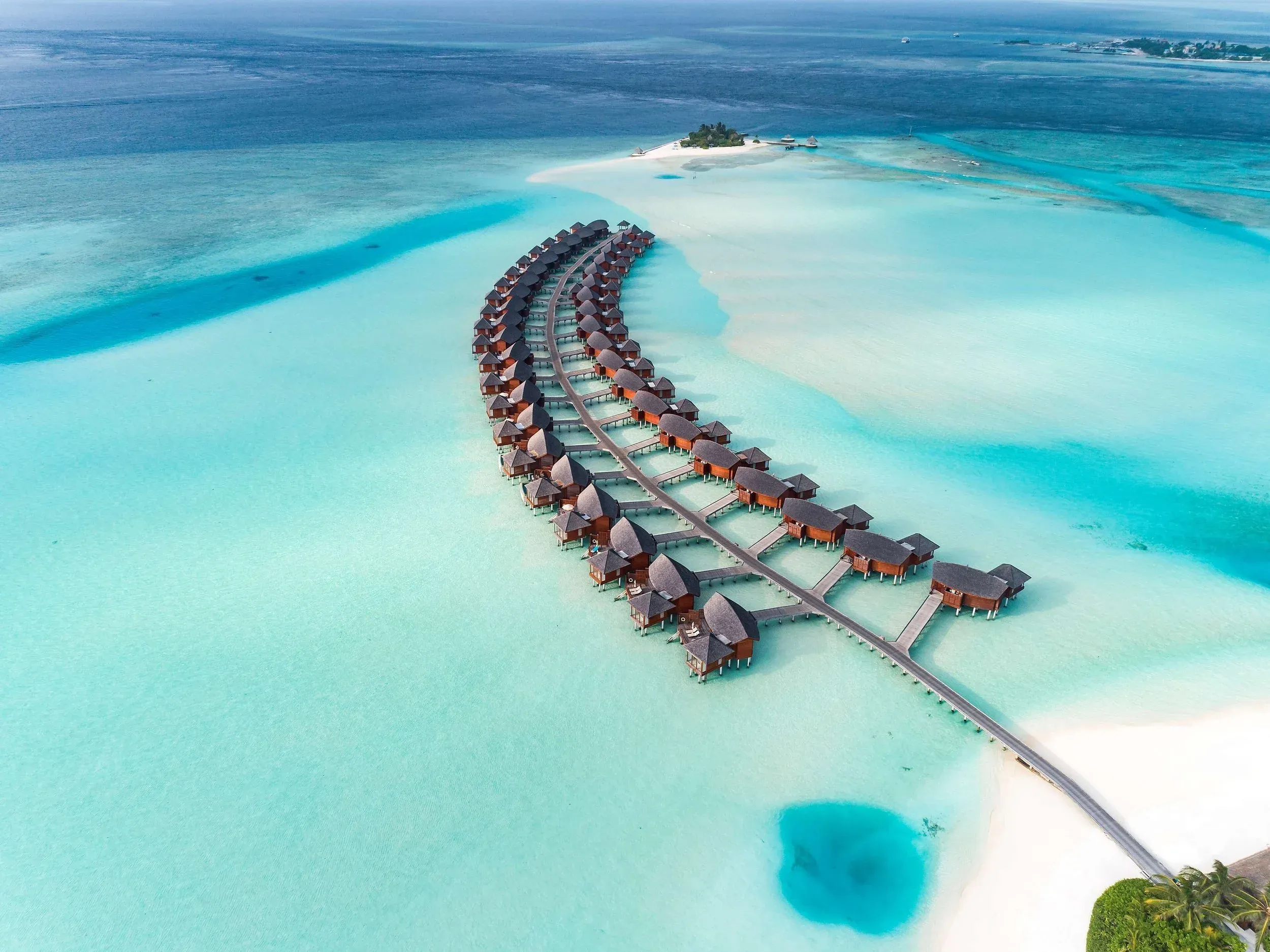 A row of overwater bungalows in the Maldives