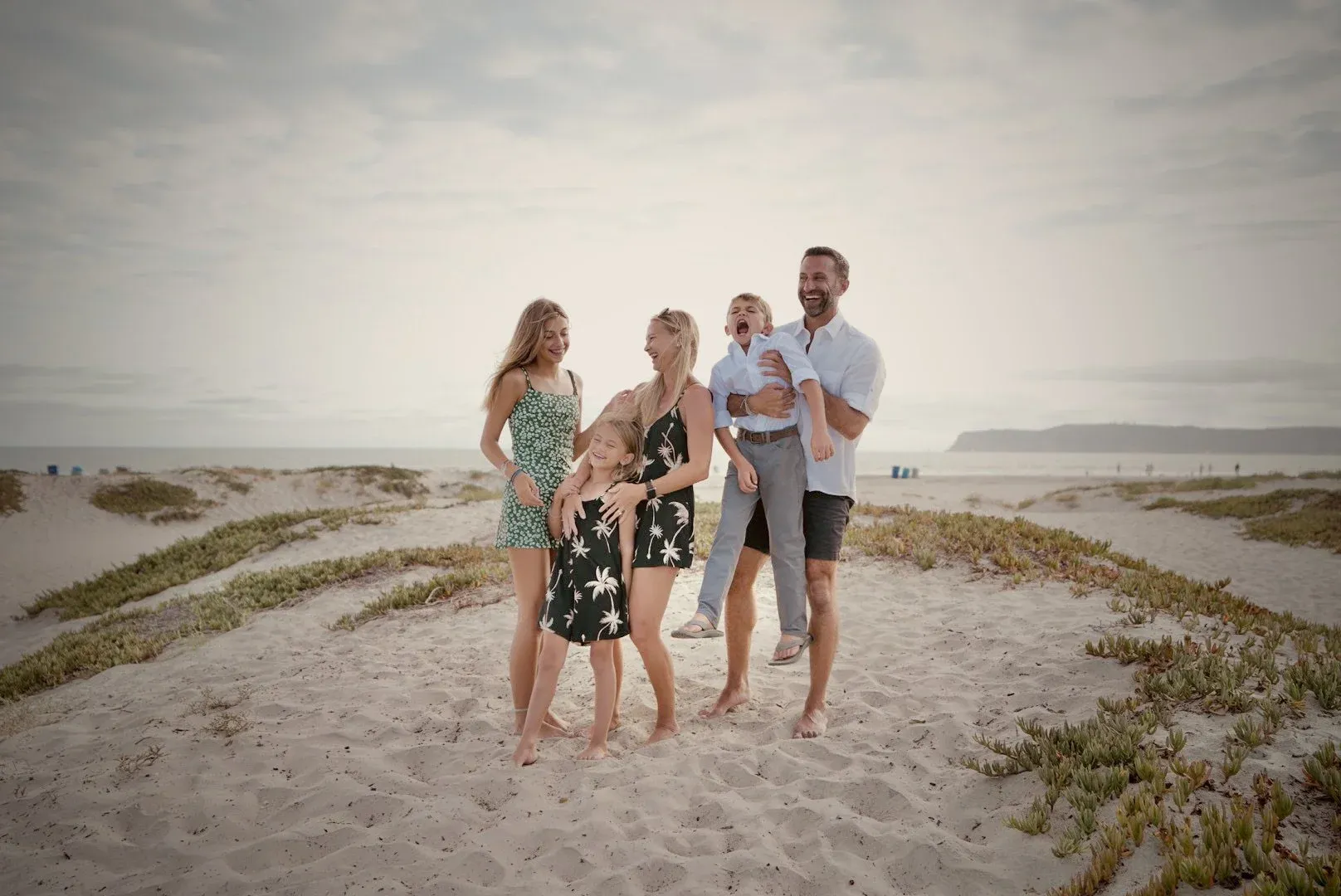 The Lockwood family plays on a beach