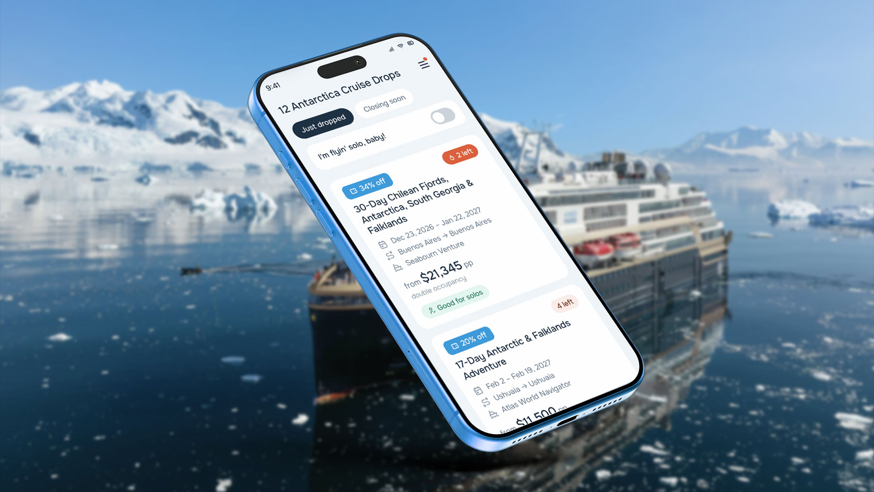 Antarctica Cruise Drop mobile app on an iphone with a ship in the background