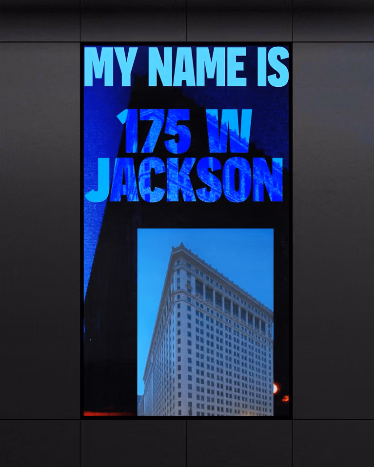 Digital sign displaying text 'MY NAME IS 175 W JACKSON' with a photo of a tall building beneath.