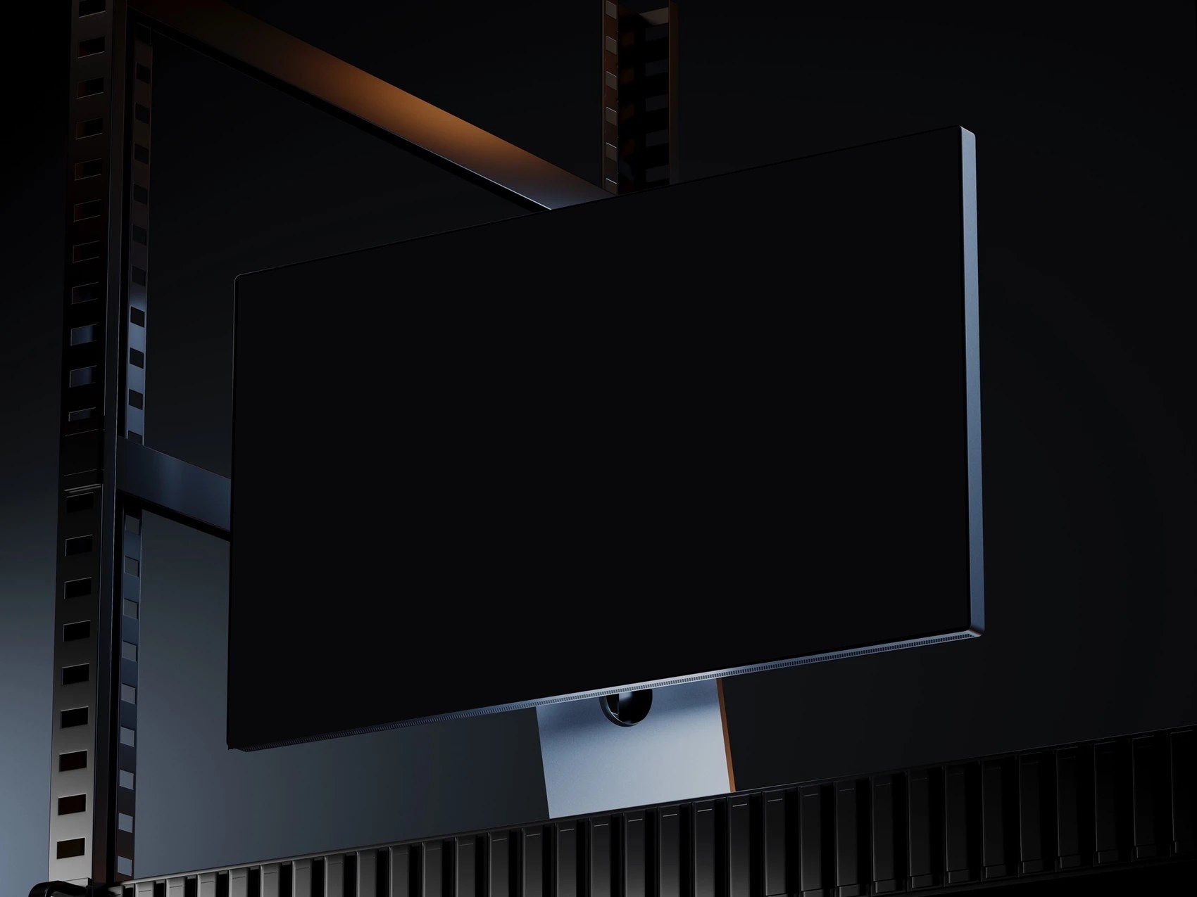 Studio Display seen from below in a dark rack room showing a building health score and AI insights