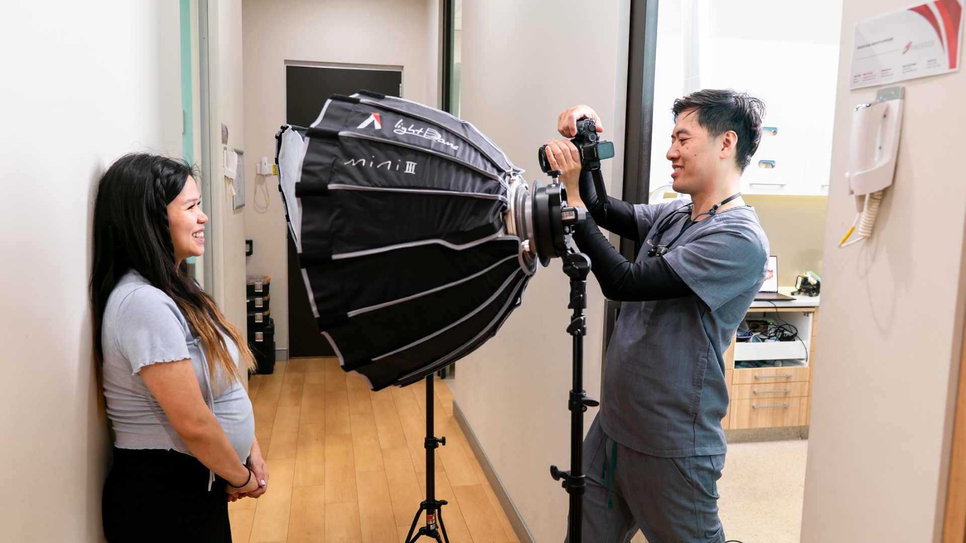Dr James Tran taking clinical photos of a patient