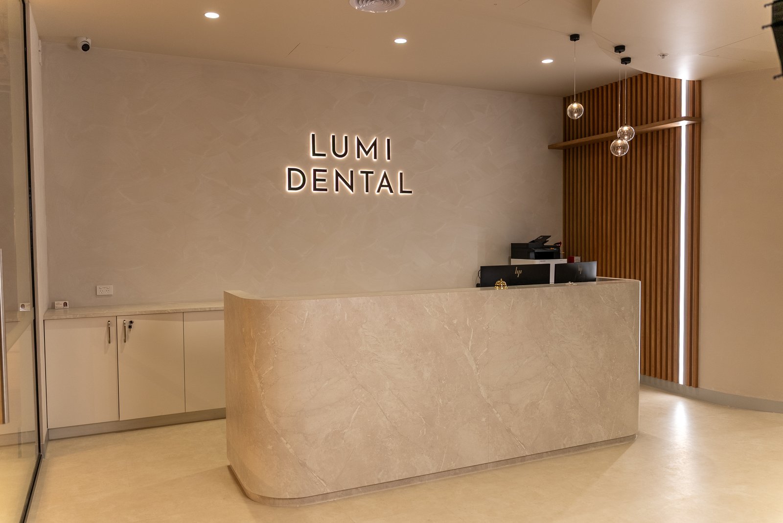 Reception desk at Lumi Dental, Melrose Central