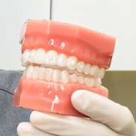 Dr James Tran taking clinical photos of a patient