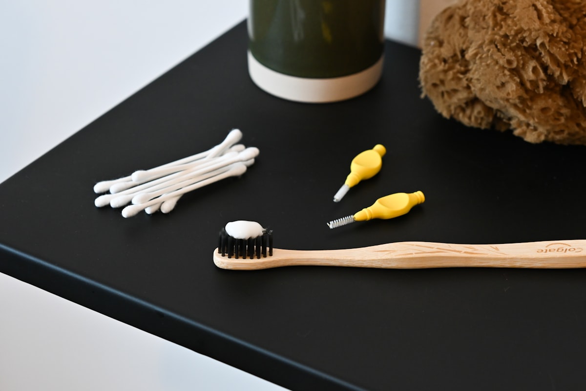 Toddler toothbrush and teddy bear representing daytime teeth grinding habits