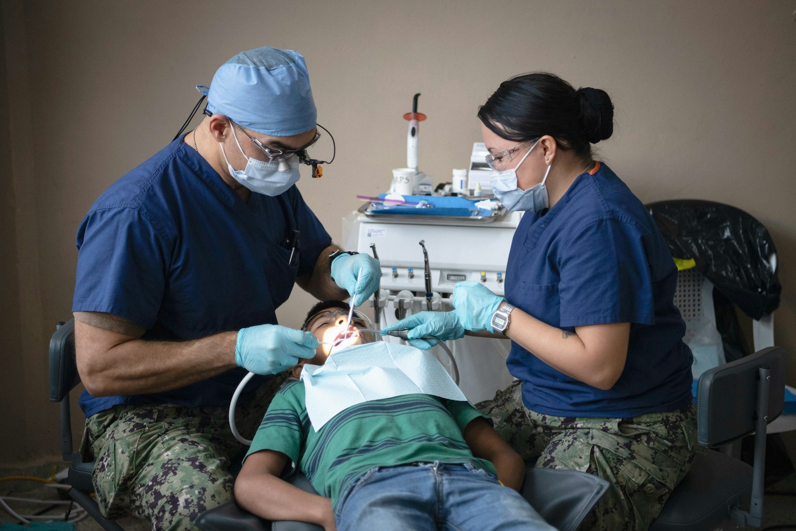 Dentist leading a consultation to review a patient's dental health