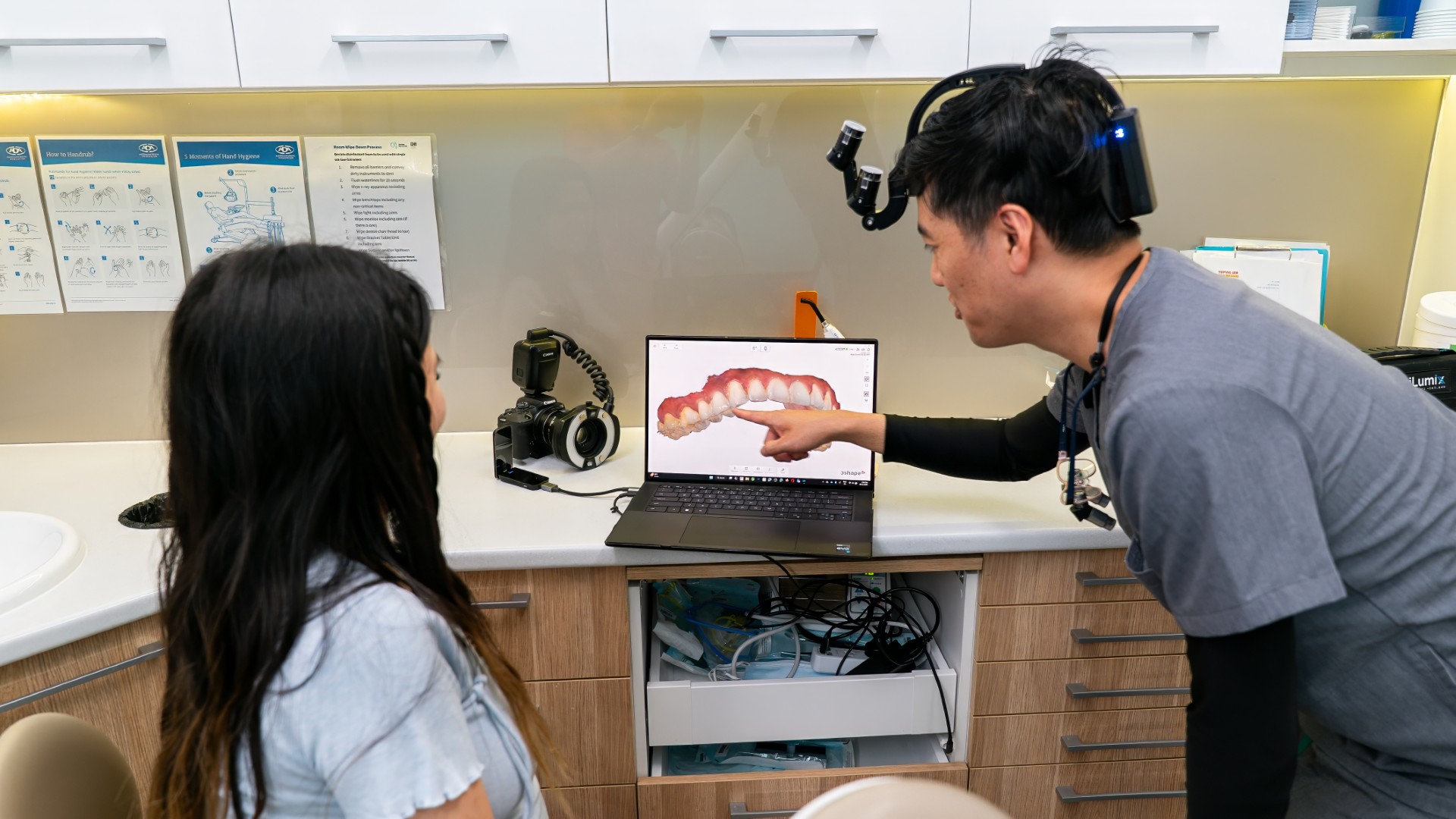 Dentist showing a patient a digital scan of her teeth