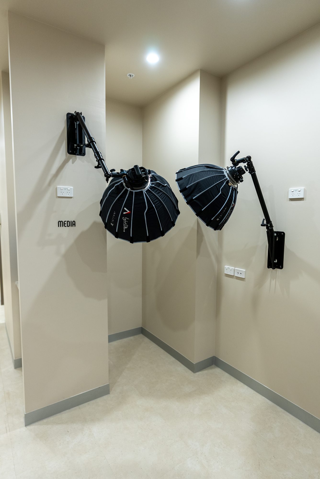 Clinical photography area with studio lighting at Lumi Dental, used to record shade before and after teeth whitening