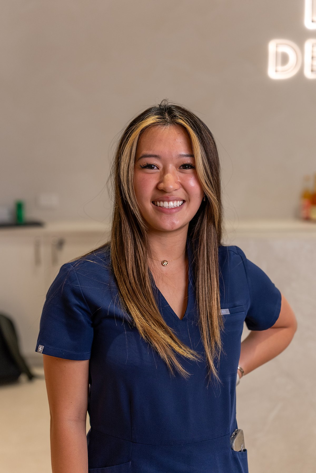 Sabrina Tran, oral health therapist at Lumi Dental, who sees patients for teeth whitening