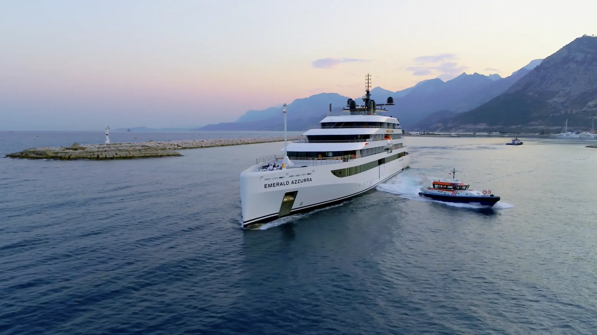 Emerald Azzurra yacht sails next to a smaller boat