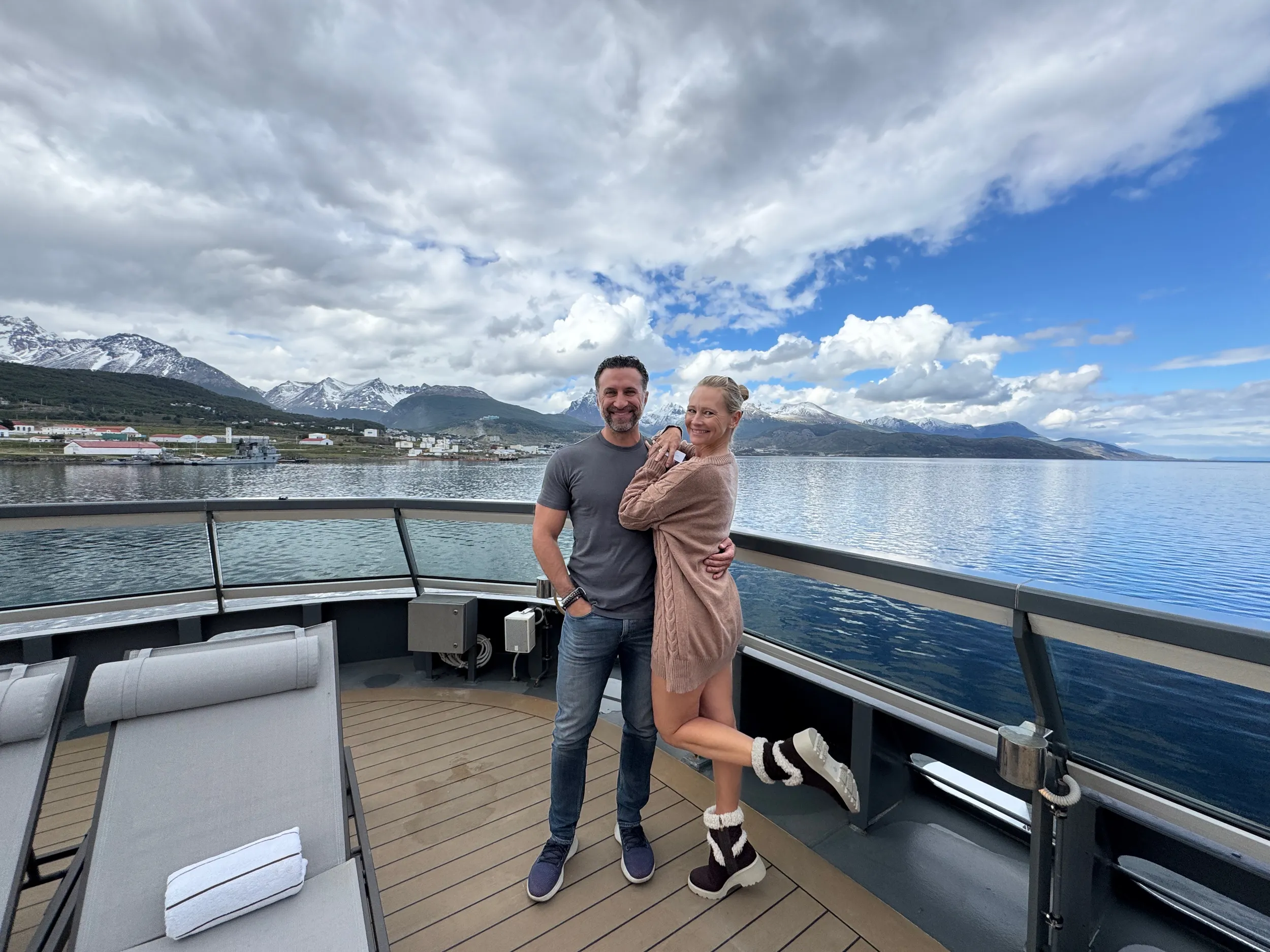 Phil and Erin Lockwood pose on the deck of a cruise ship in Ushuaia