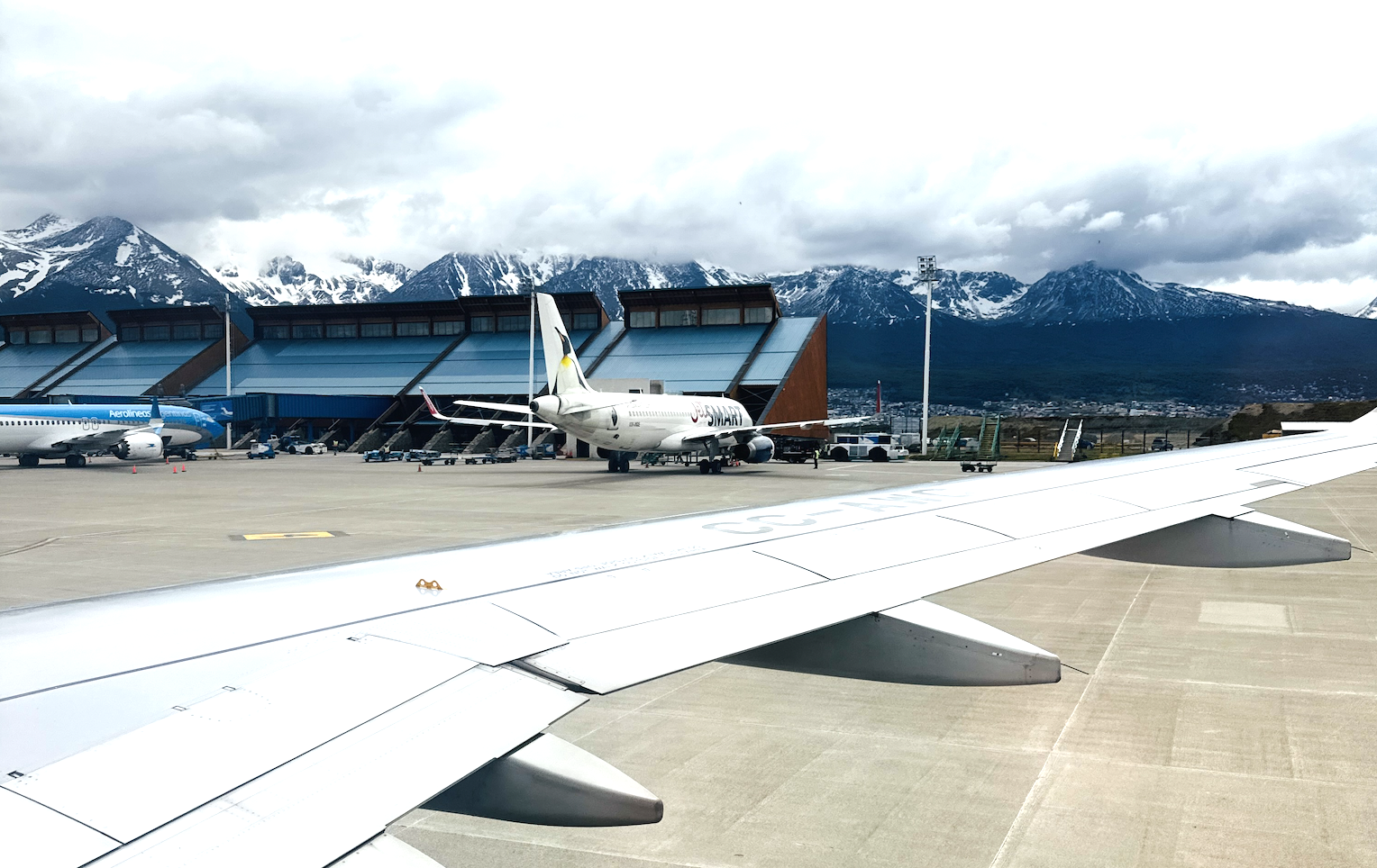 View from an airplane window on the tarmac of Ushuaia airport