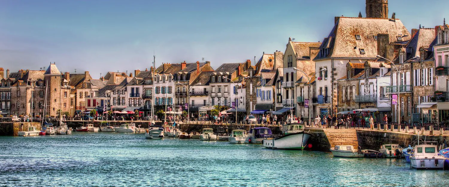 Historical buildings along a river in France