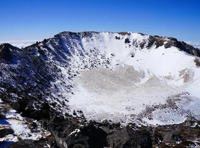 A snow-covered mountain bowl in Jeju