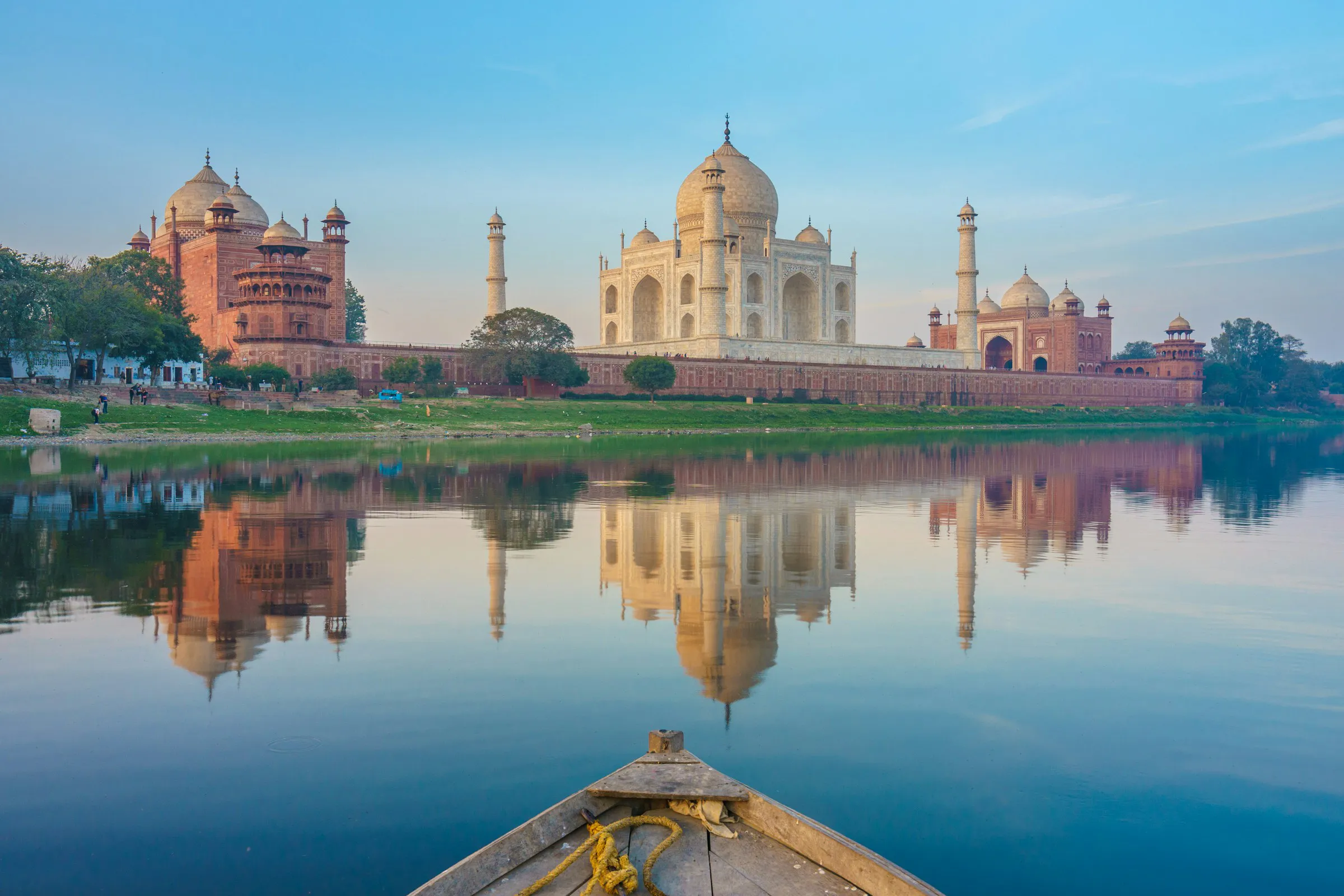 Taj Mahal in the distance with water reflection
